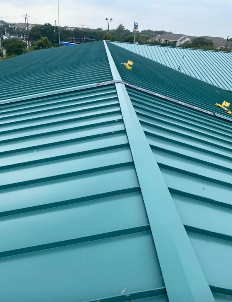 Green commercial metal roof ridge and valley for Metal Roof Repair in Hebron