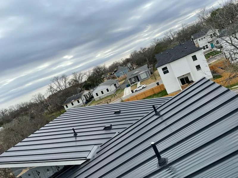 Standing seam metal roof panels with vents for Skylight Repair in Hebron